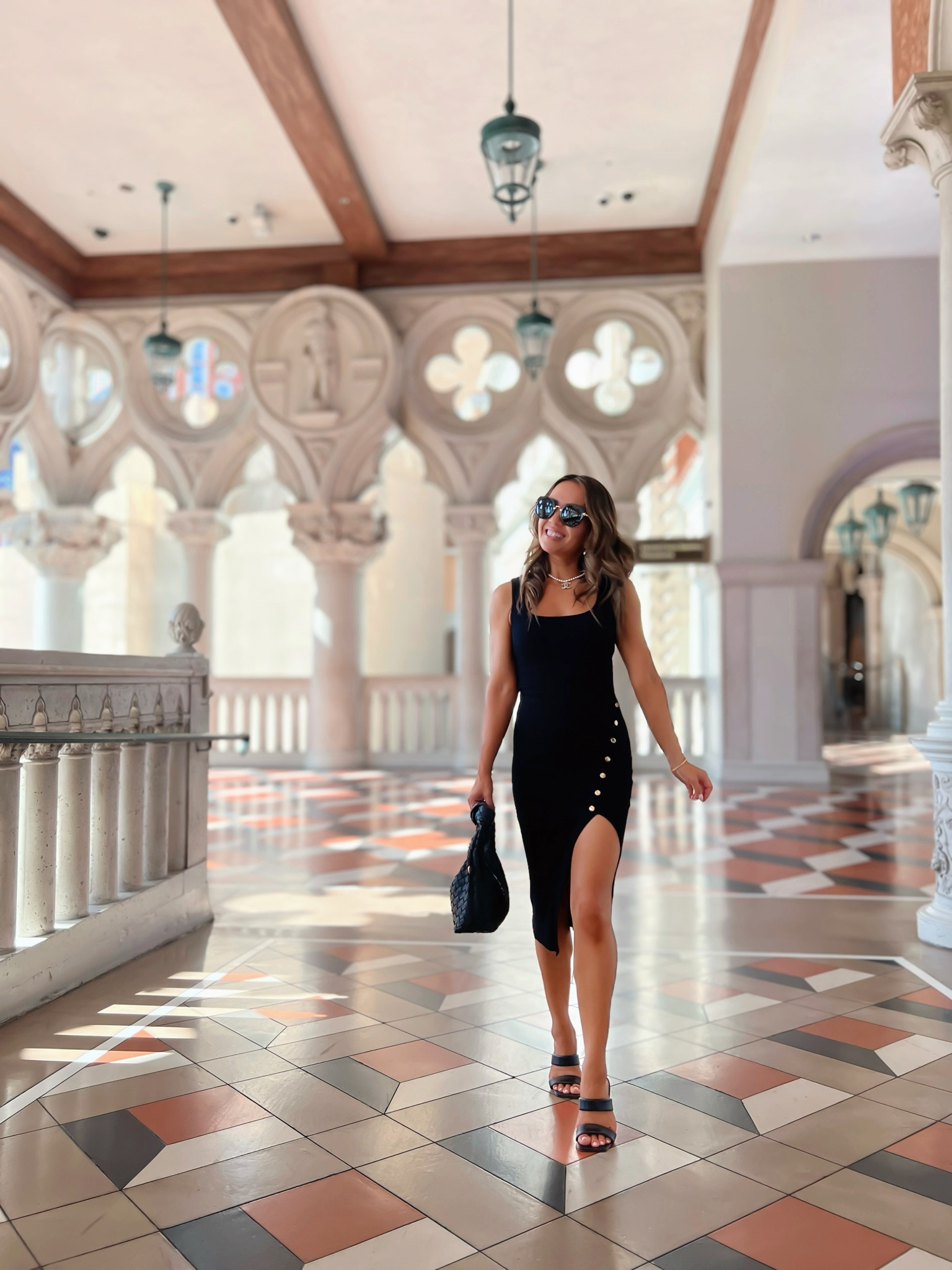 This black midi dress is so good! Wearing size XS 

Love the high slit and gold button details 

Petite friendly and great for travel or date night! 

#LTKFindsUnder50 #LTKSaleAlert #LTKFindsUnder100