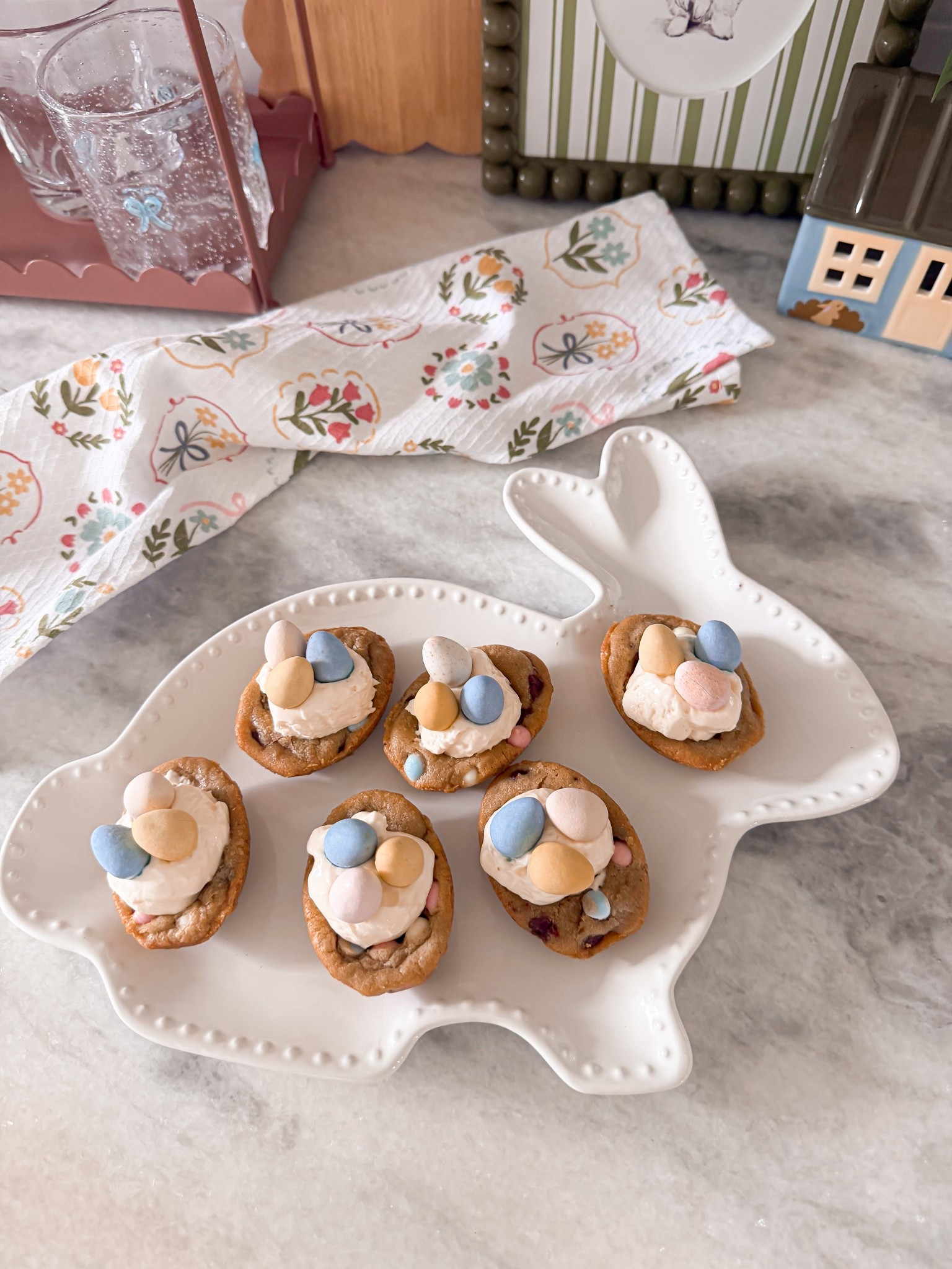 Here are the steps for the Cadbury Cheesecake Cookie Nests 🤍

• place Pillsbury spring cookie dough into an egg silicone mold
• bake according to package directions
• while cookies are still warm, gently press a small well in the center
• let cool completely
• add a scoop of Philadelphia cheesecake dip
• top with 3 Cadbury mini eggs

that’s it. the easiest little spring dessert.

you can also make these in a muffin tin if you don’t have an egg mold!

#LTKKids #LTKSeasonal #LTKfoodie