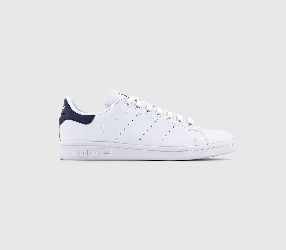 adidas
								Stan Smith Trainers
								Sustainable White Navy | OFFICE London (UK)