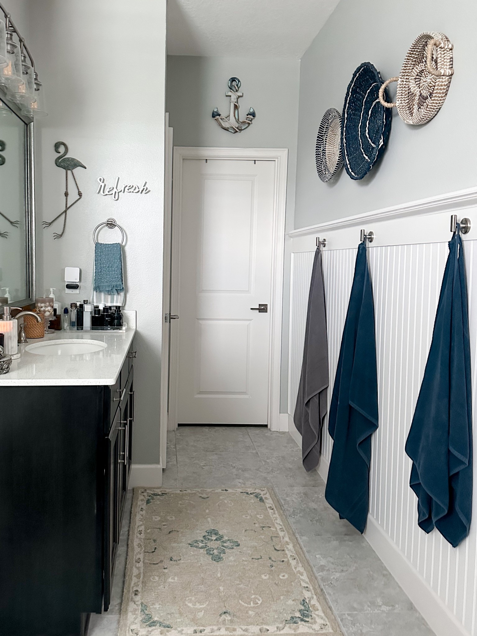 Coastal spa vibe bathroom, only thing I would change is a white oak cabinet love the quartz counter excited for when we move. #bathroom #masterbathroom #bluebathroom #spabath #luxurybathroom #turkishtowels #loloirugs #bathroomrugs #aquapops #anchor #coastalideas

#LTKHome #LTKSeasonal #LTKStyleTip