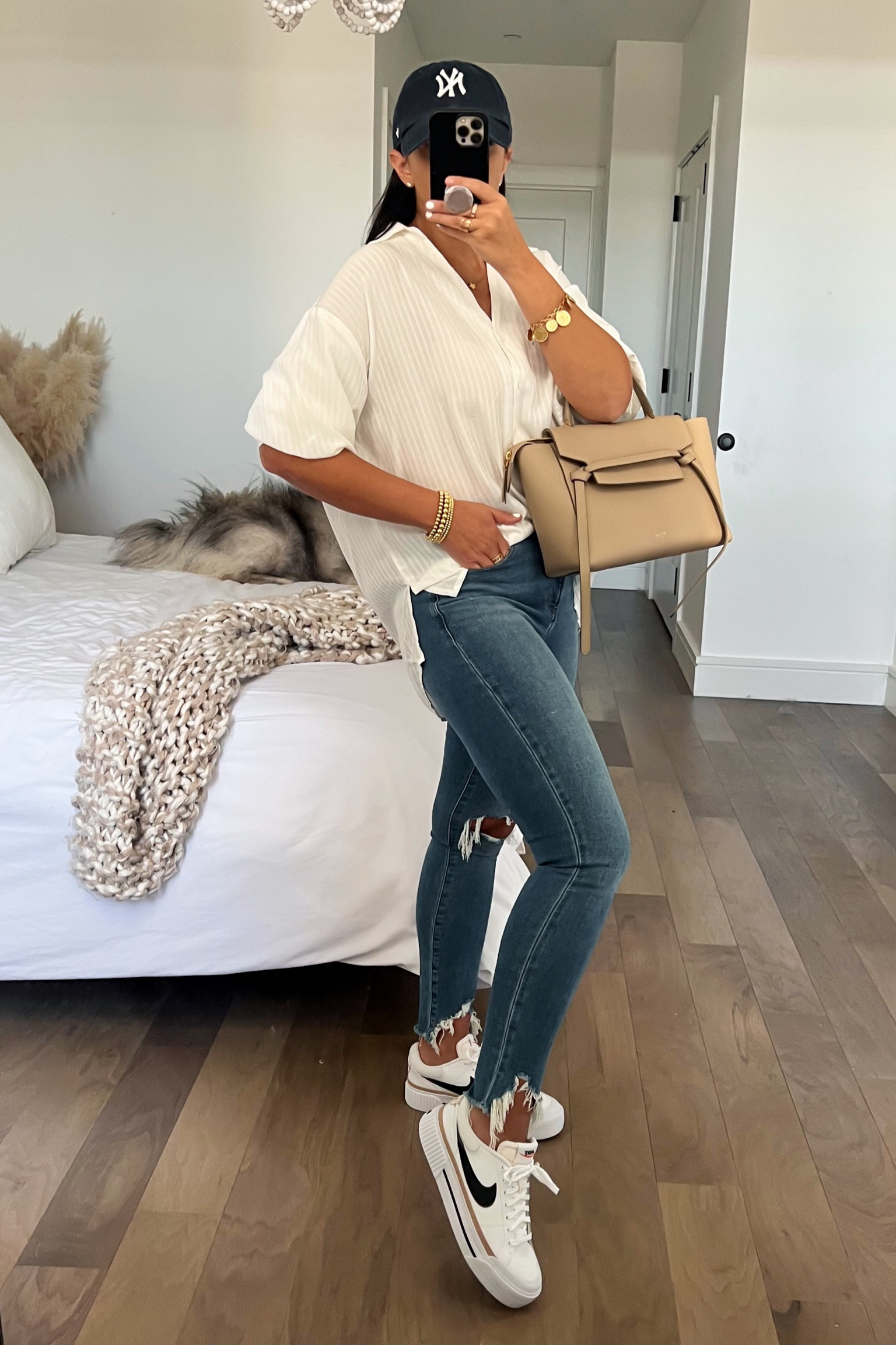 Nike sneakers runs true to size. White top wearing size small 