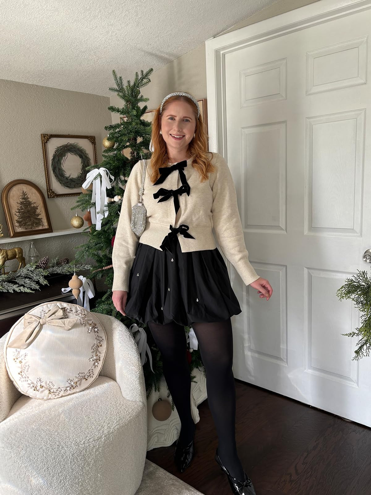 velvet bow cardigan. bubble mini skirt. black tights. bubble skirt. holiday outfit. bow cardigan.... | Amazon (US)