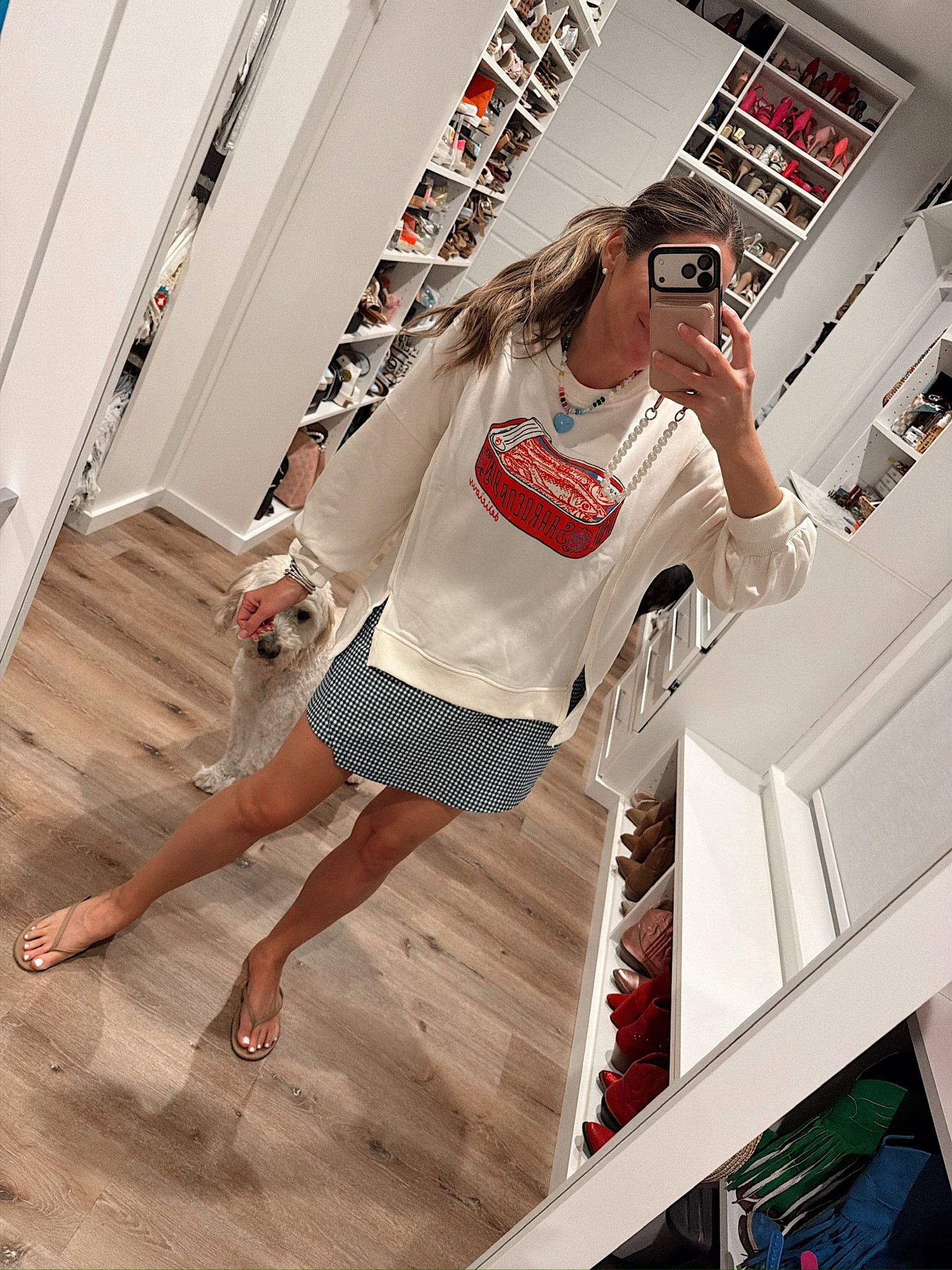 In a medium sardine graphic sweatshirt, medium active dress, sandals and accessories- fits tts.

#LTKFindsUnder50 #LTKSeasonal