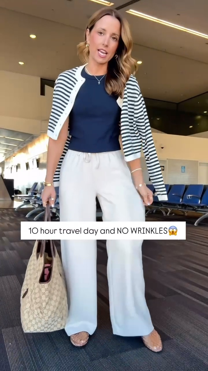 My travel outfit of the day! Aritzia The Lodge Pant - Crepette. Size XS regular, color ‘Metropolis Taupe’. Comes in short and tall, too. Wrinkle resistant with an elastic waist and high-rise. Aritzia t-shirt in XS. Aritzia striped cropped cardigan in 2XS. Jelly ballet flats are whole sizes only. I’m a 6.5 and sized down to a 6 per reviews. Business casual. Elevated casual. Workwear. Coastal outfit.

#LTKWorkwear #LTKTravel #LTKootd