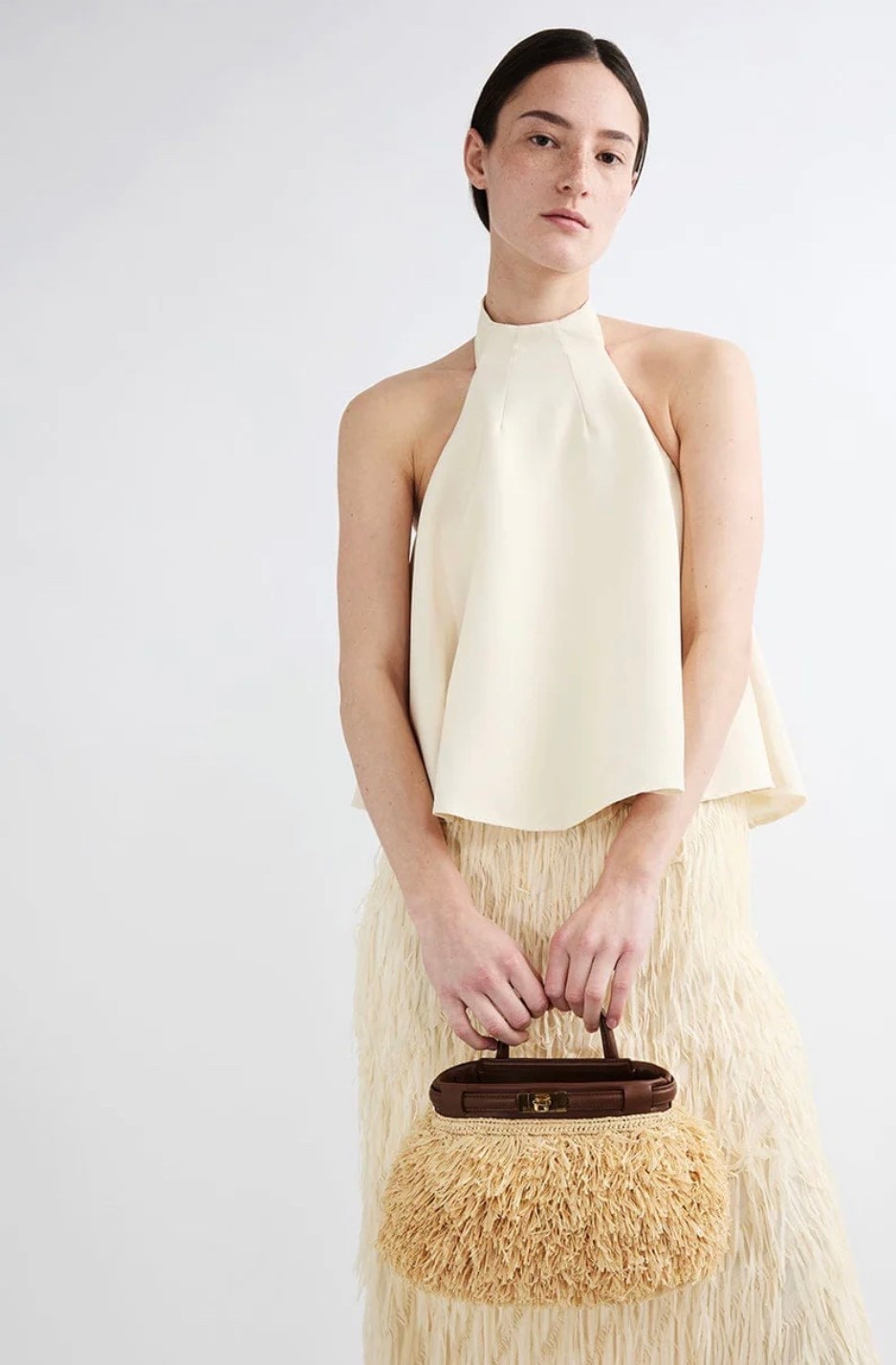 I’m typically not a fan of raffia bags, but this one is a statement maker. So unique. 