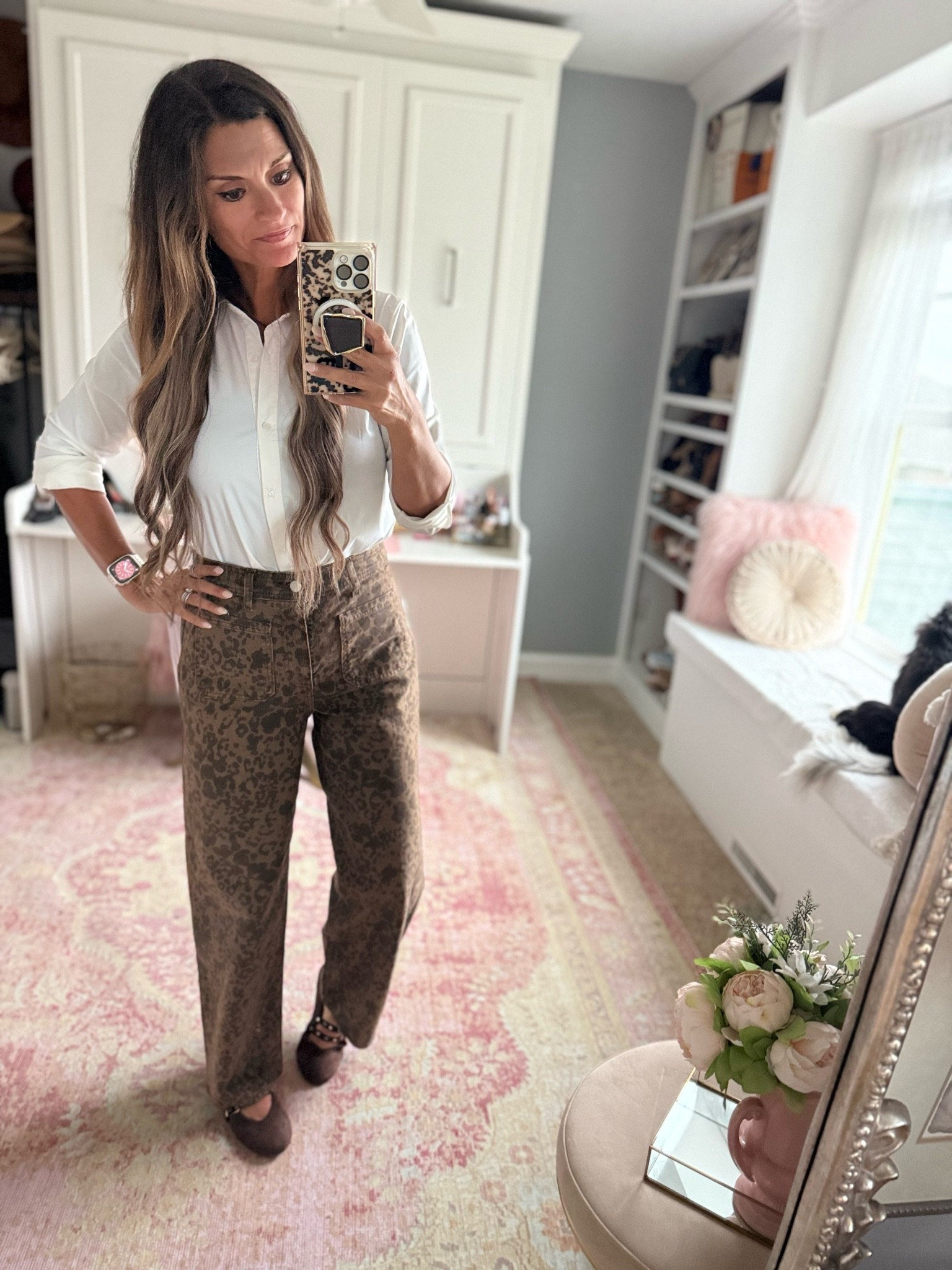 Date night look for fall in a white button down and leopard pants
