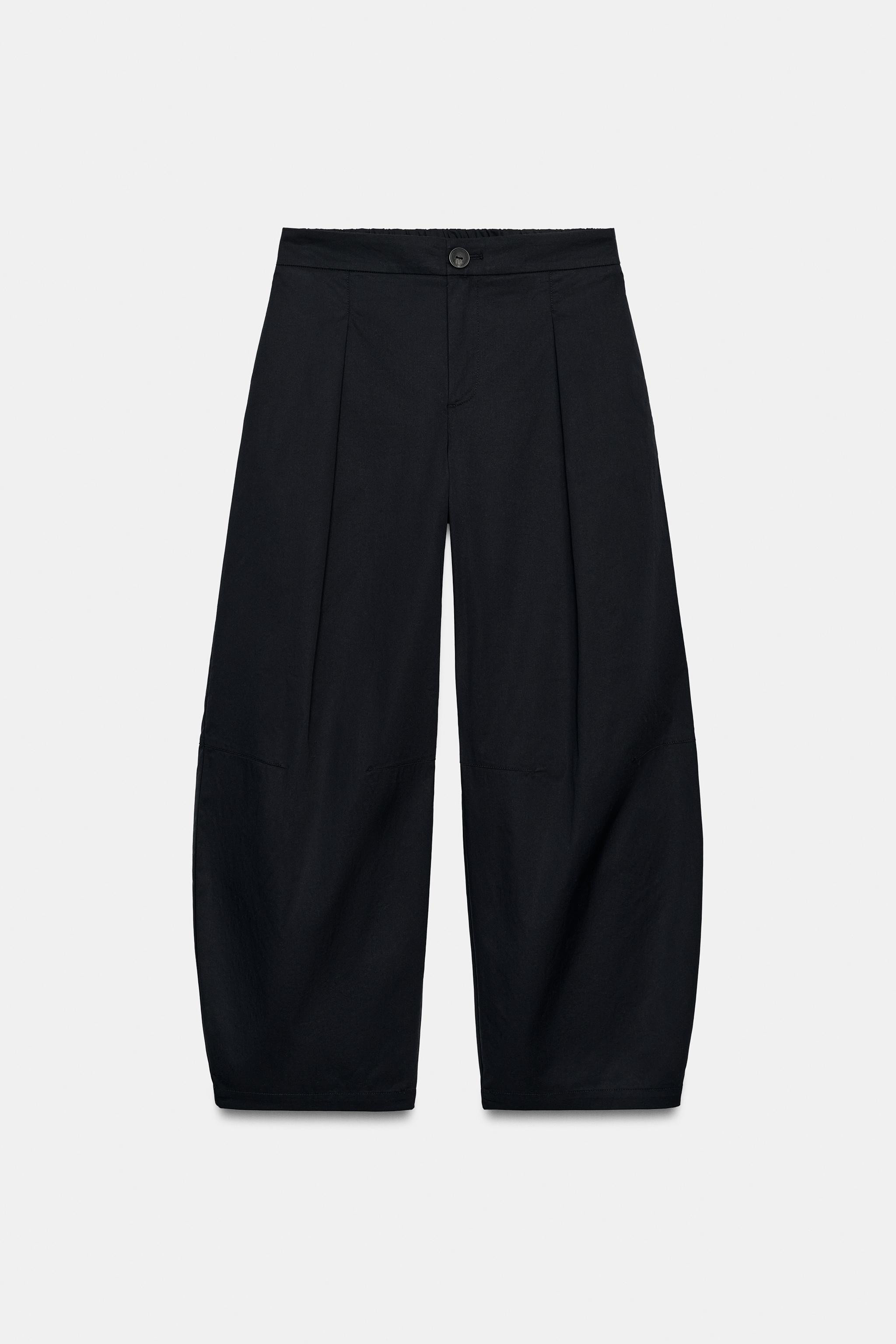 Trousers with an elasticated waistband at the back. Featuring front pockets and rear patch pocket... | Zara UK