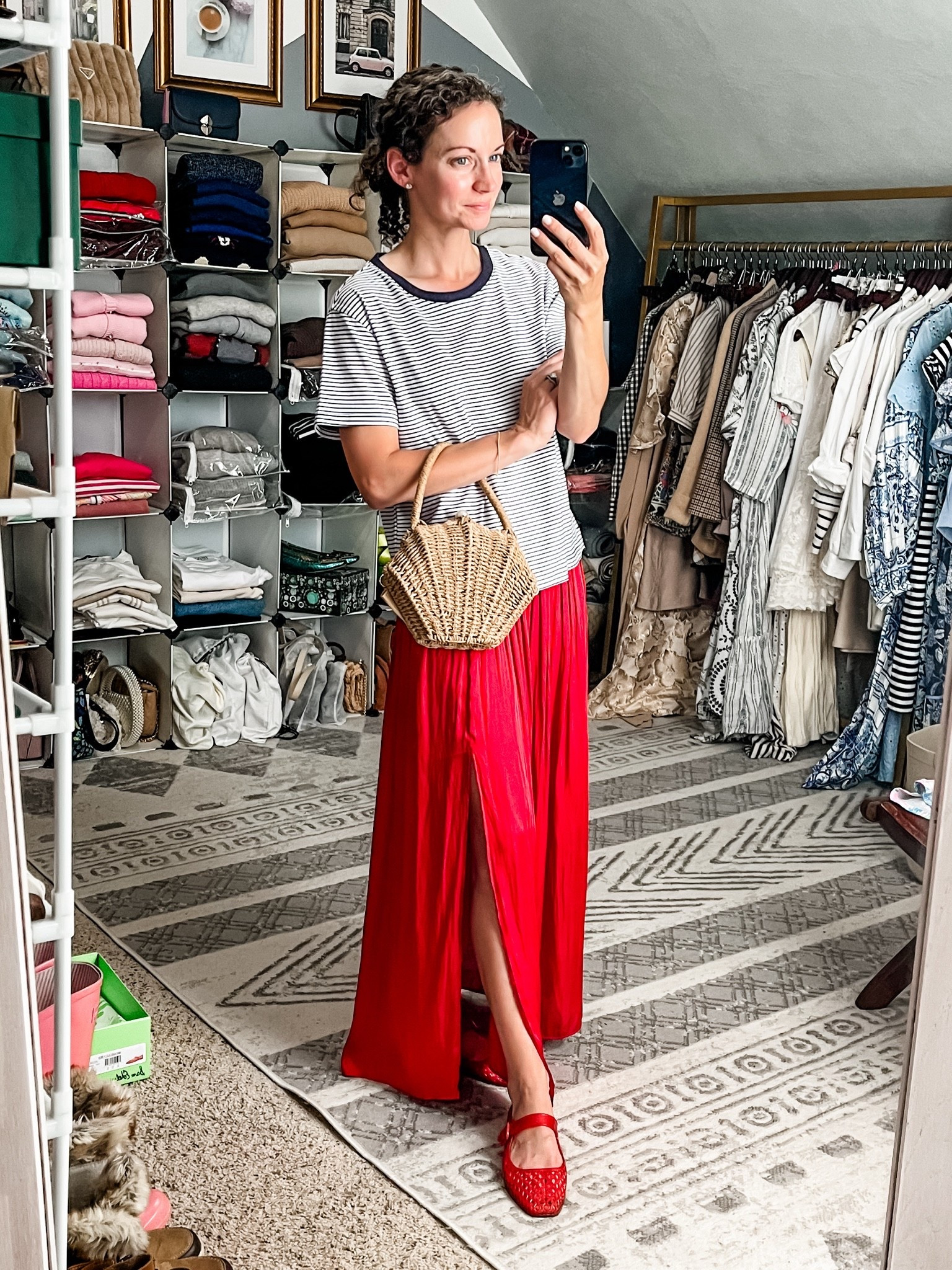 Casual Parisian inspired outfit!
Stripe cotton tshirt is from Walmart, linking similar. 
Red pleated skirt is old from J.Crew, linking similar. 
Earrings are from Amazon. 
Bracelet is from a local boutique, linking similar. 
Rattan seashell handbag is from Chicwish. 
Red jelly flats are from Sam Edelman. 
Modest outfit. Petite outfit. Classic outfit. Summer outfit.

#LTKmomlife #LTKOver40 #LTKdayinmylife