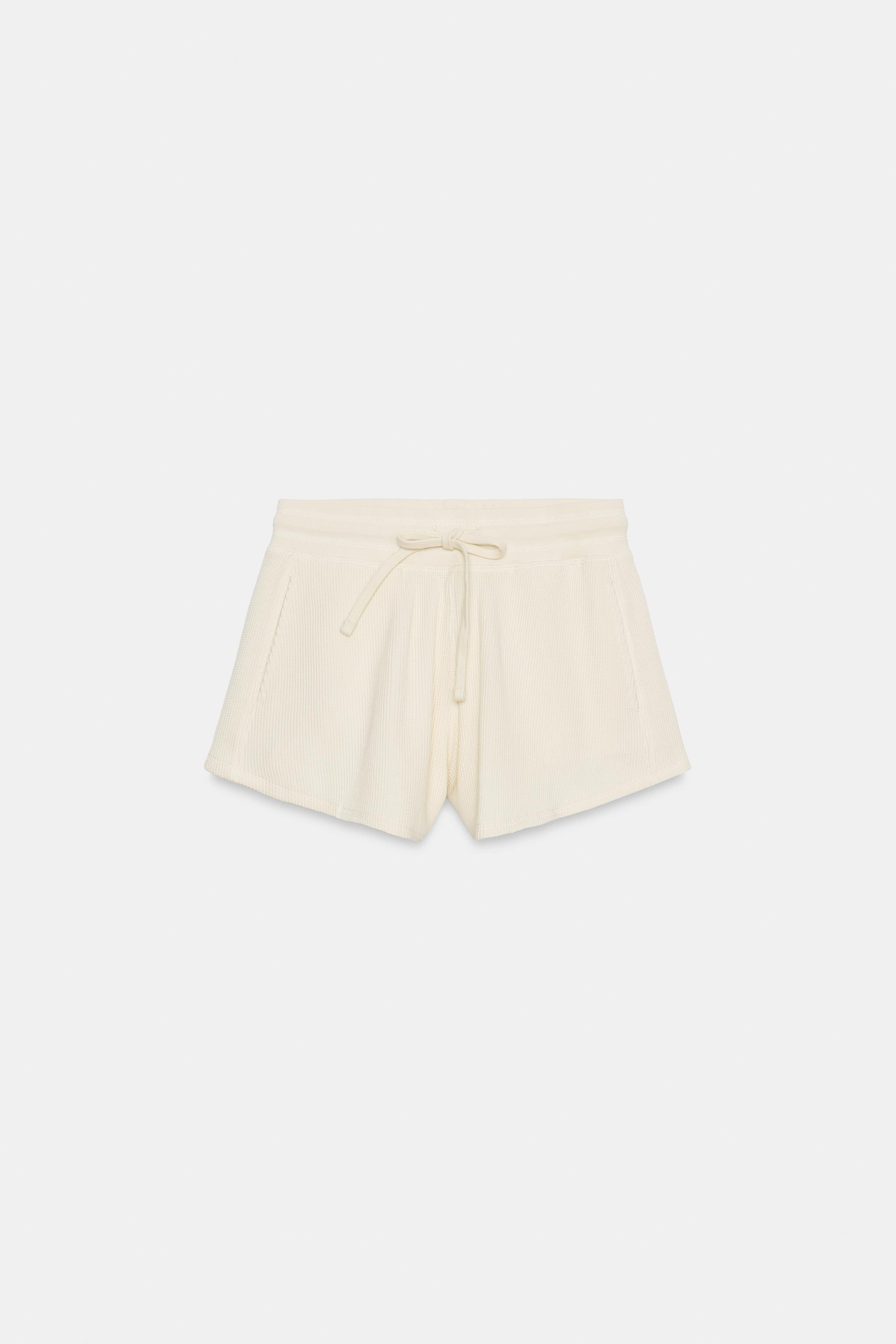 Shorts in cotton yarn. Mid-waist with an adjustable drawstring elastic waistband and side in-seam... | Zara UK