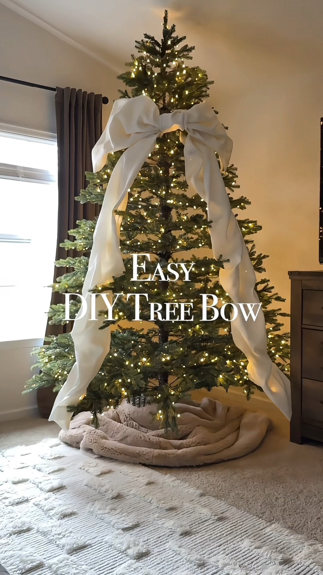 The cheapest, easiest DIY oversized tree bow! 
Christmas oversized bow, Christmas tree topper, diy Christmas decor, sparse Christmas tree, Rushmore fir, velvet curtains, statement bow

#LTKHome #LTKSeasonal #LTKHoliday