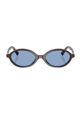 Miu Miu Oval Sunglasses in Brown | FWRD 
