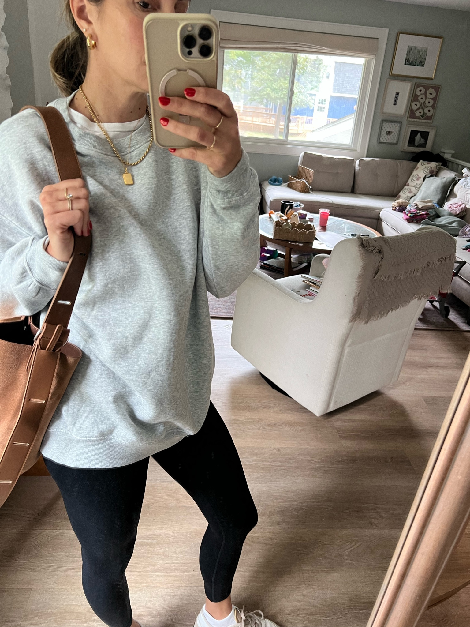 The comfiest, oversized $10 sweatshirt. I'm wearing a small. 