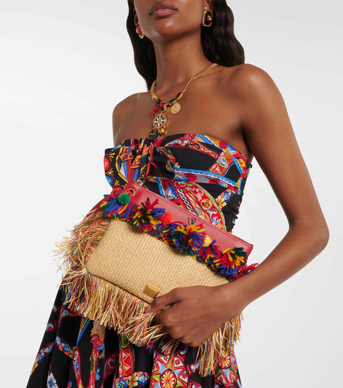 Fringed woven leather-trimmed pouch | Mytheresa (INTL)