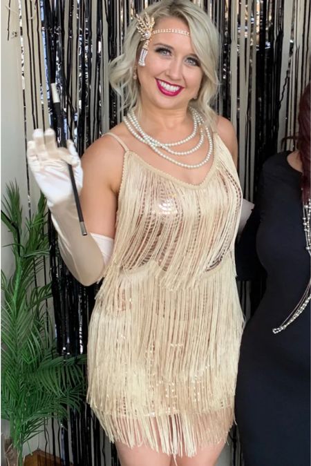 This champagne dress with tassels is absolutely perfect for a Great Gatsby Roaring 20s party!

#LTKunder100