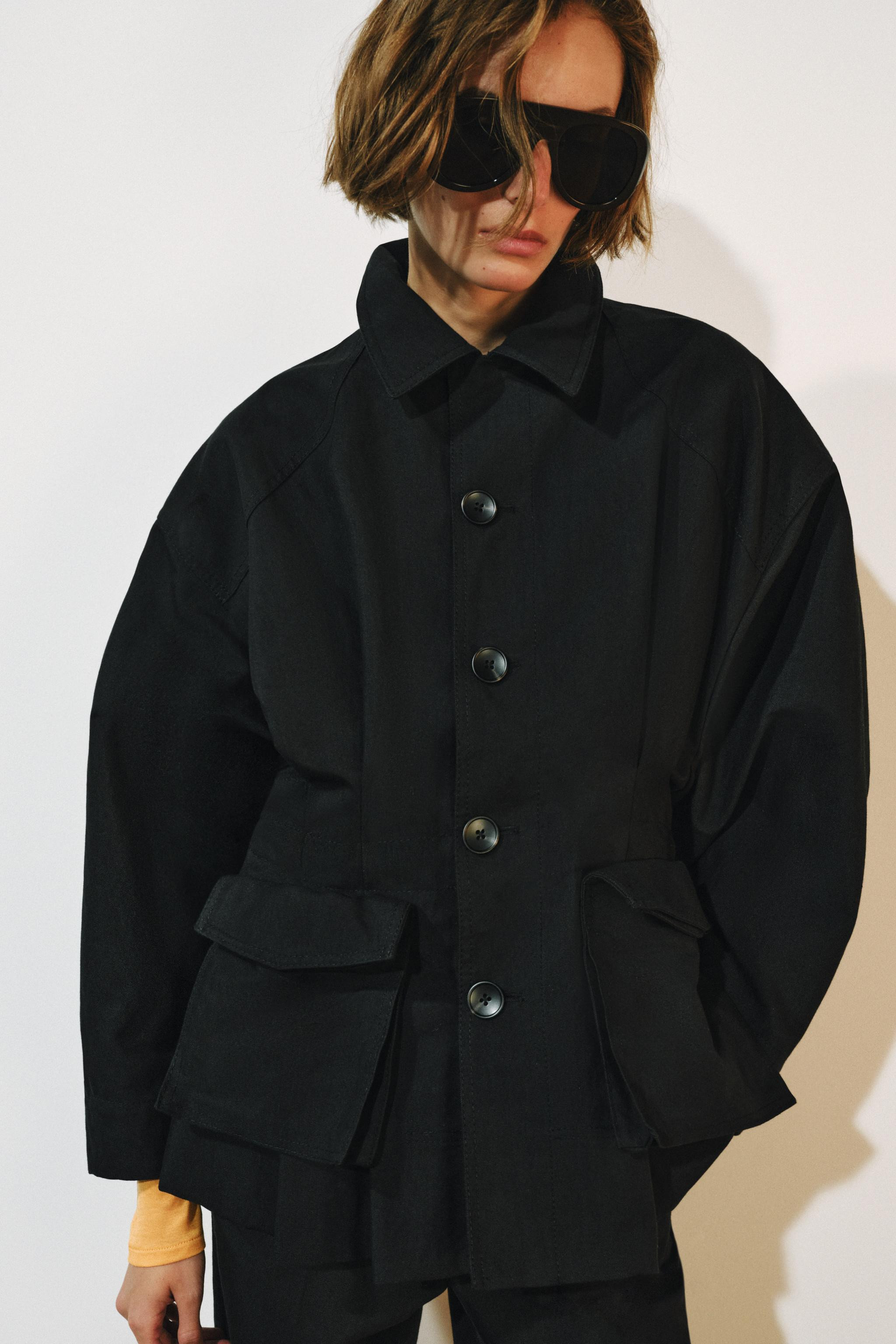 ZARA WOMAN COLLECTION. Jacket with a lapel collar and long sleeves. Front patch pockets with flap... | Zara US
