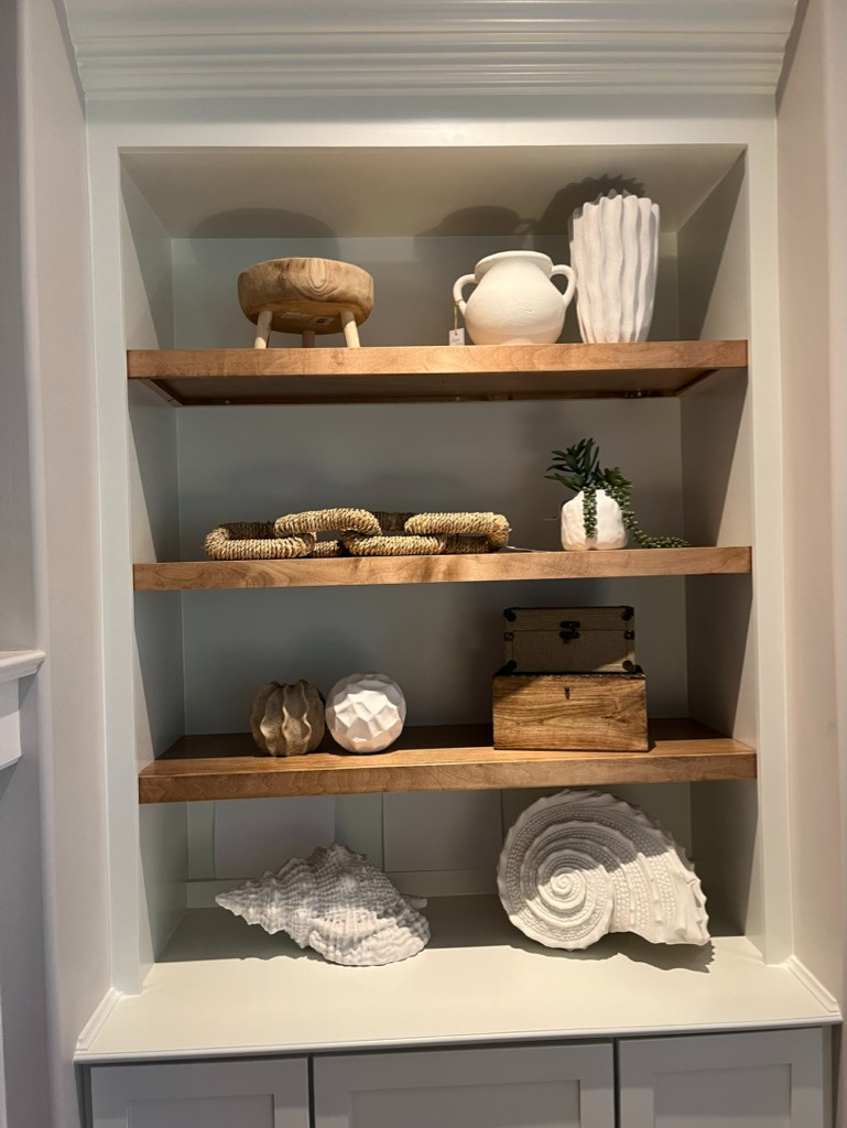 Your shelves don’t need more decor they need this

I always edit first then layer in a mix of books, objects, and natural textures so everything has a purpose

It pulls everything together and keeps your shelves clean, calm, and intentionally styled

Save this before you restyle and shop my picks

#AmandaAndCoDesign #ShelfStyling #BeachHome 

 #LTKselfcare #LTKOver40 #LTKHome