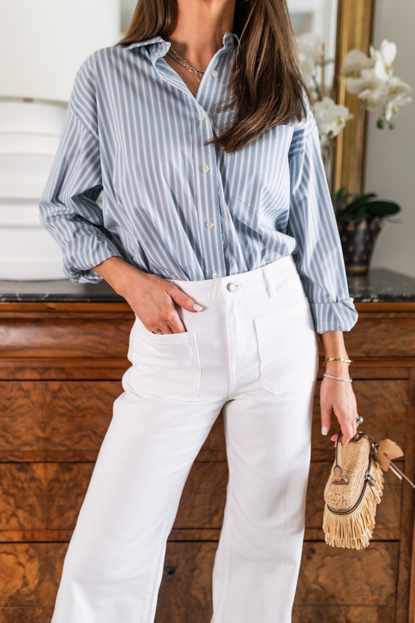 You can't go wrong with a white jean & striped button down. I'm wearing a 26 in the jeans and a small in the top. I've paired it with the cutest raffia top handle bag that you'll reach for more then you think this spring & summer. 



@michaelkors @dillards #mkpartner 

 

#LTKootd #LTKOver40 #LTKTall

#LTKTall #LTKootd #LTKOver40
