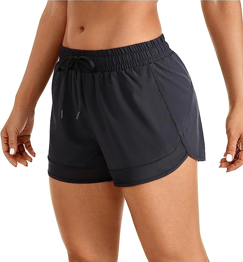 CRZ YOGA Women's Mid Rise Running Shorts Mesh Liner 3'' - Quick Dry Drawstring Workout Athletic G... | Amazon (US)