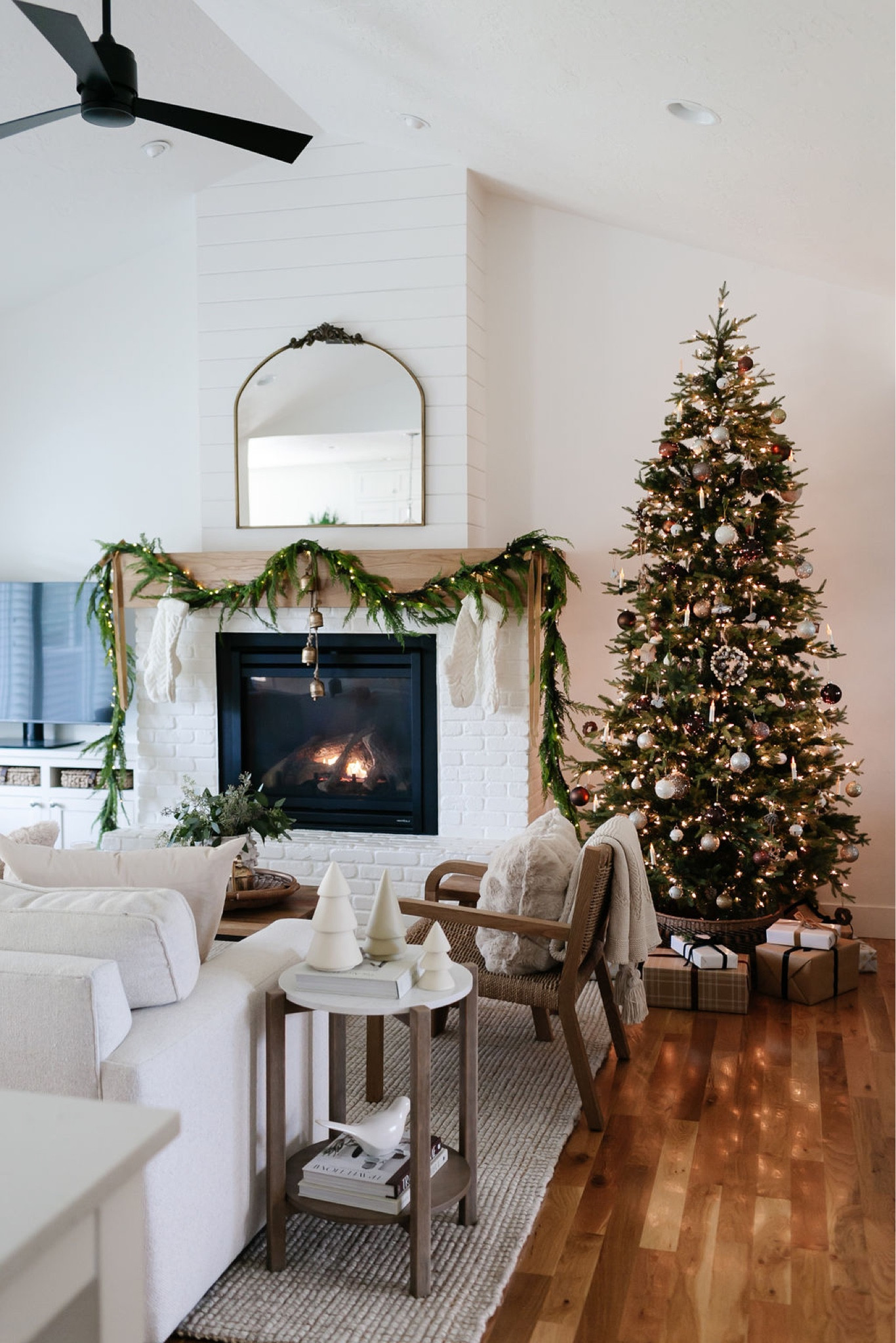 Christmas living room decor inspiration. Christmas tree, Christmas decor, Christmas garland, brass mirror  

#LTKstyletip #LTKHoliday #LTKhome