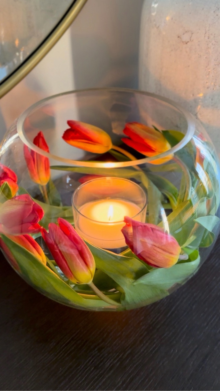 Spring tulip arrangement 🌷 An easy, elevated way to mix candlelight + fresh florals in one dreamy centerpiece. As long as the tulip stems stay in water, they’ll thrive—even in this unexpected floating moment. Simple, chic, and perfect for Spring & Summer hosting or any special occasion.

#LTKSeasonal #LTKHome #LTKWedding