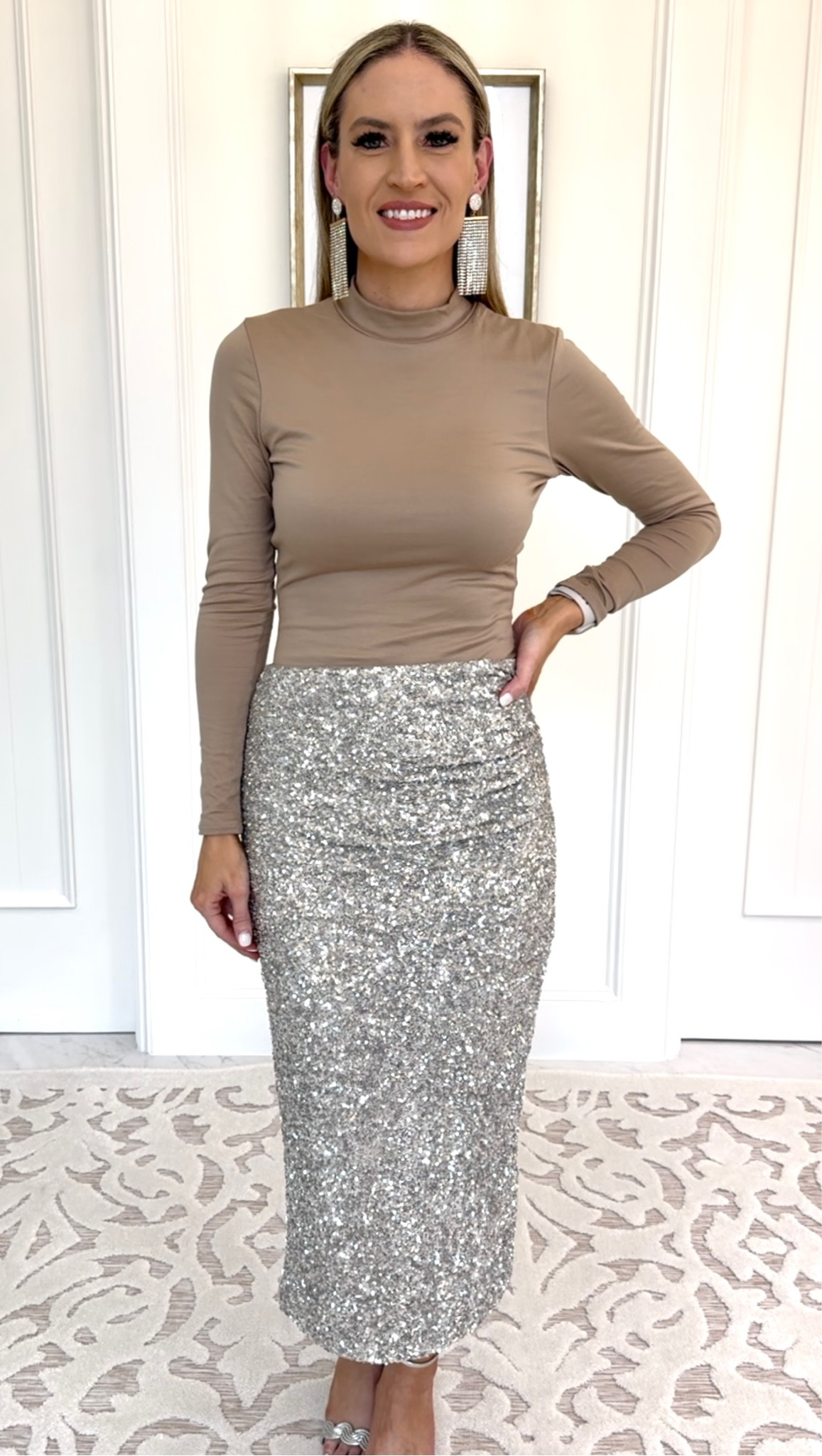 ✨ Holiday Outfit ✨

Sequins are so fun and sparkly - perfect for the holidays! Don’t be afraid to pair it with a different colored top - it doesn’t have to match perfectly. This taupe bodysuit is buttery soft and flows well with the silvery sequins. 

#everypiecefits

Christmas party outfit
Holiday party outfit
Christmas outfit 
New Year’s Eve outfit 
New Year’s Eve party 

#LTKparties #LTKHoliday #LTKSeasonal