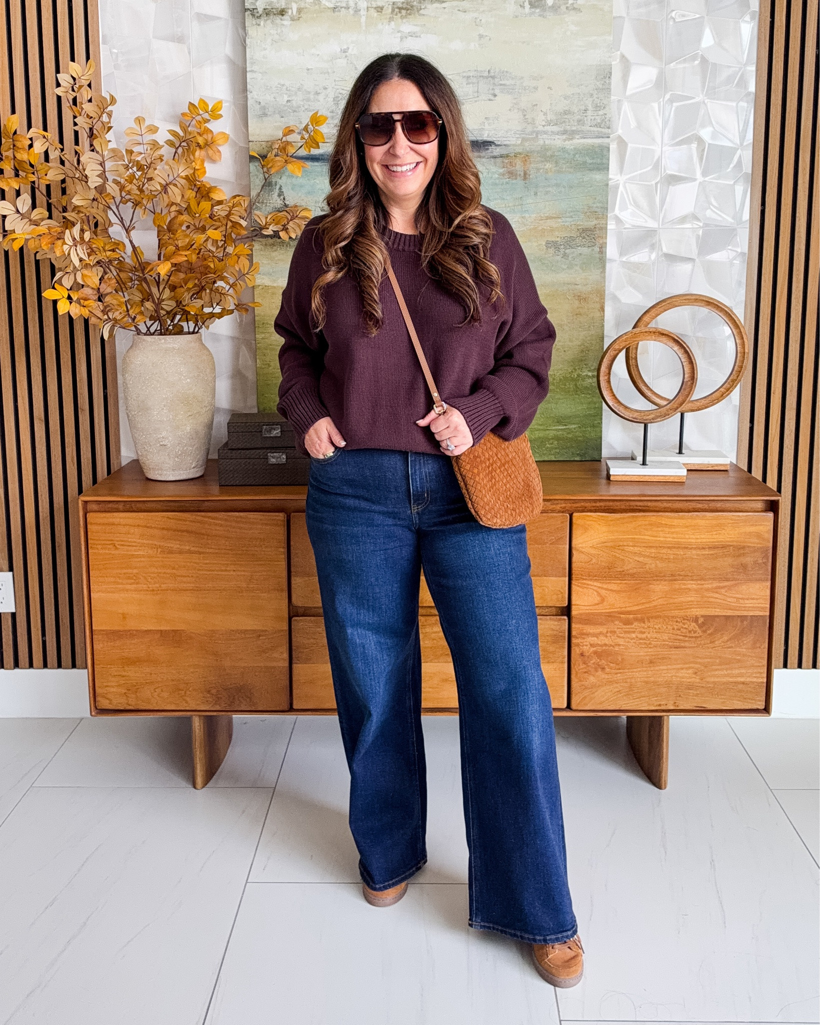 Dressed in head to toe Quince...this year I had to grab this new color of my favorite go to sweater last fall and paired it with my fav Bella jeans and woven crossbody for a perfect everyday fall look! Wearing sweater tts, L and jeans, 31 

 #LTKSeasonal #LTKOver40 #LTKMidsize