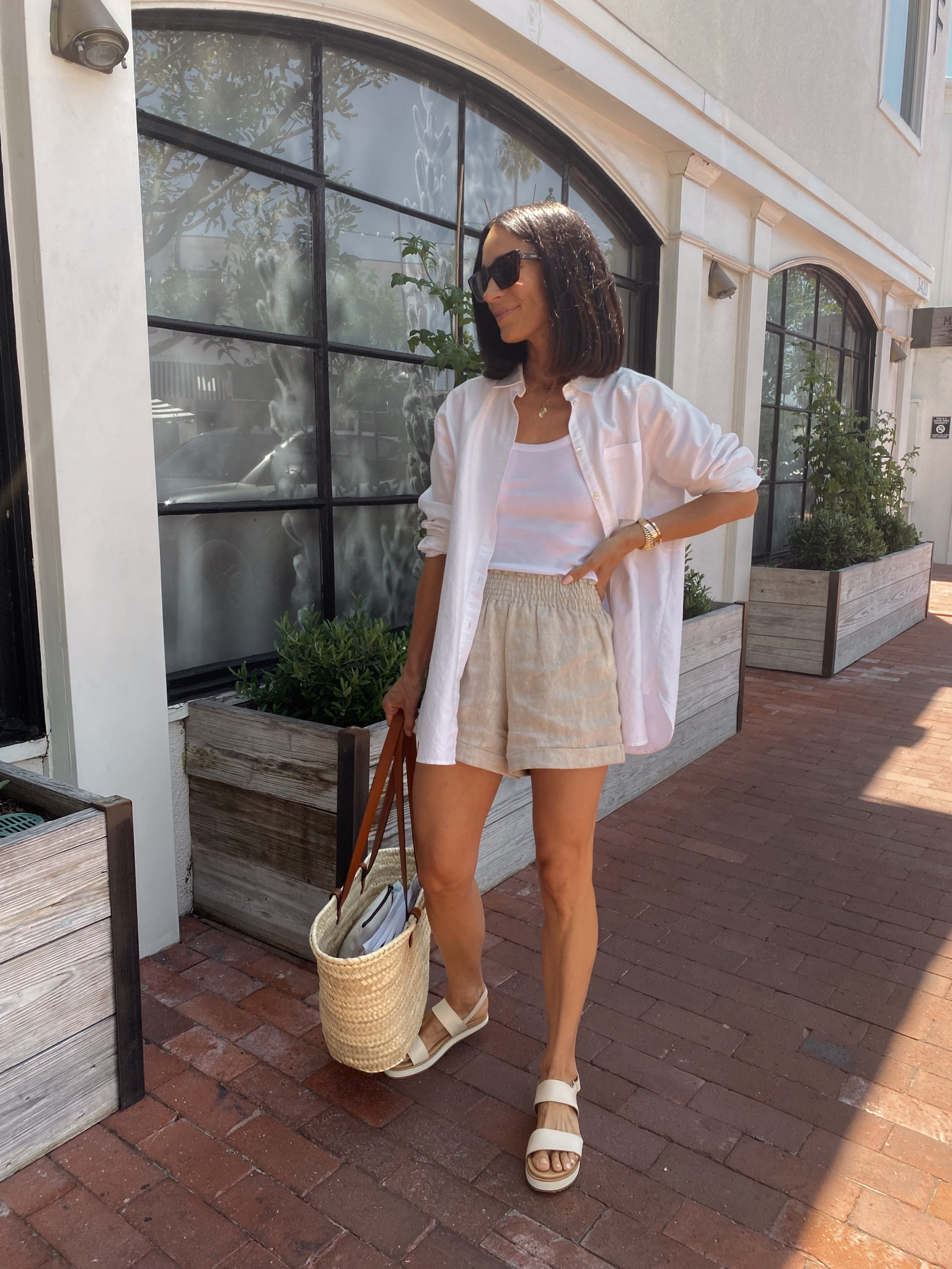 Today’s summer outfit from June’s capsule wardrobe 
Oatmeal linen shorts Tts 
White ribbed tank tts 
Sandals are 20% off for first purchase with code SHANNON20 and run a 1/2 size small 

#LTKstyletip