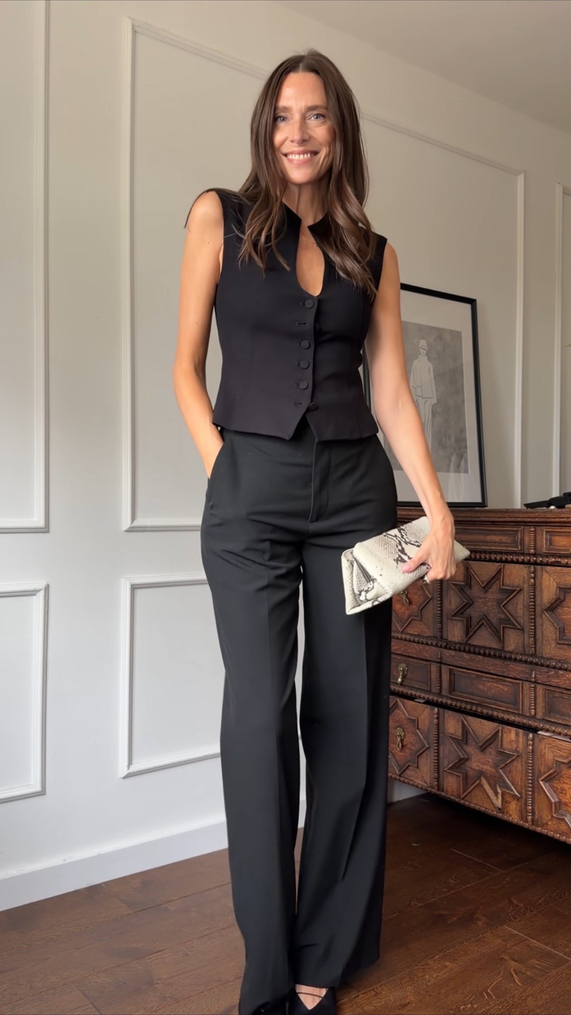 I’m wearing a small in the trousers and an extra small in the waistcoat. 

Long black trousers, black waistcoat, snake print handbag, tall girl approved.

#LTKuk #LTKautumn #LTKworkwear