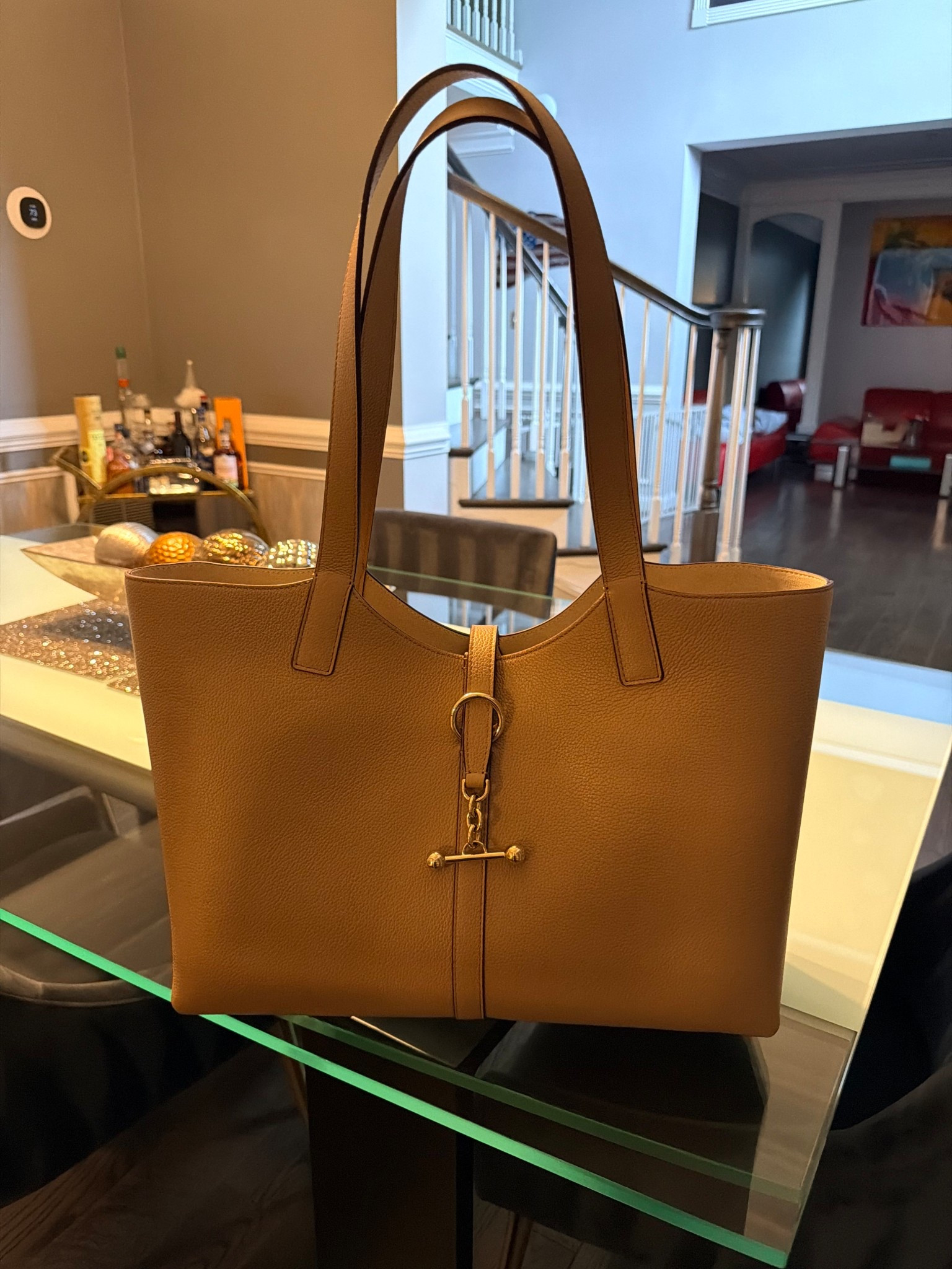 This Strathberry bag is absolutely breathtaking! 
Big enough to travel with yet convenient enough to put a large (16”) laptop in it for work! 

#LTKWorkwear #LTKmomlife #LTKMidsize