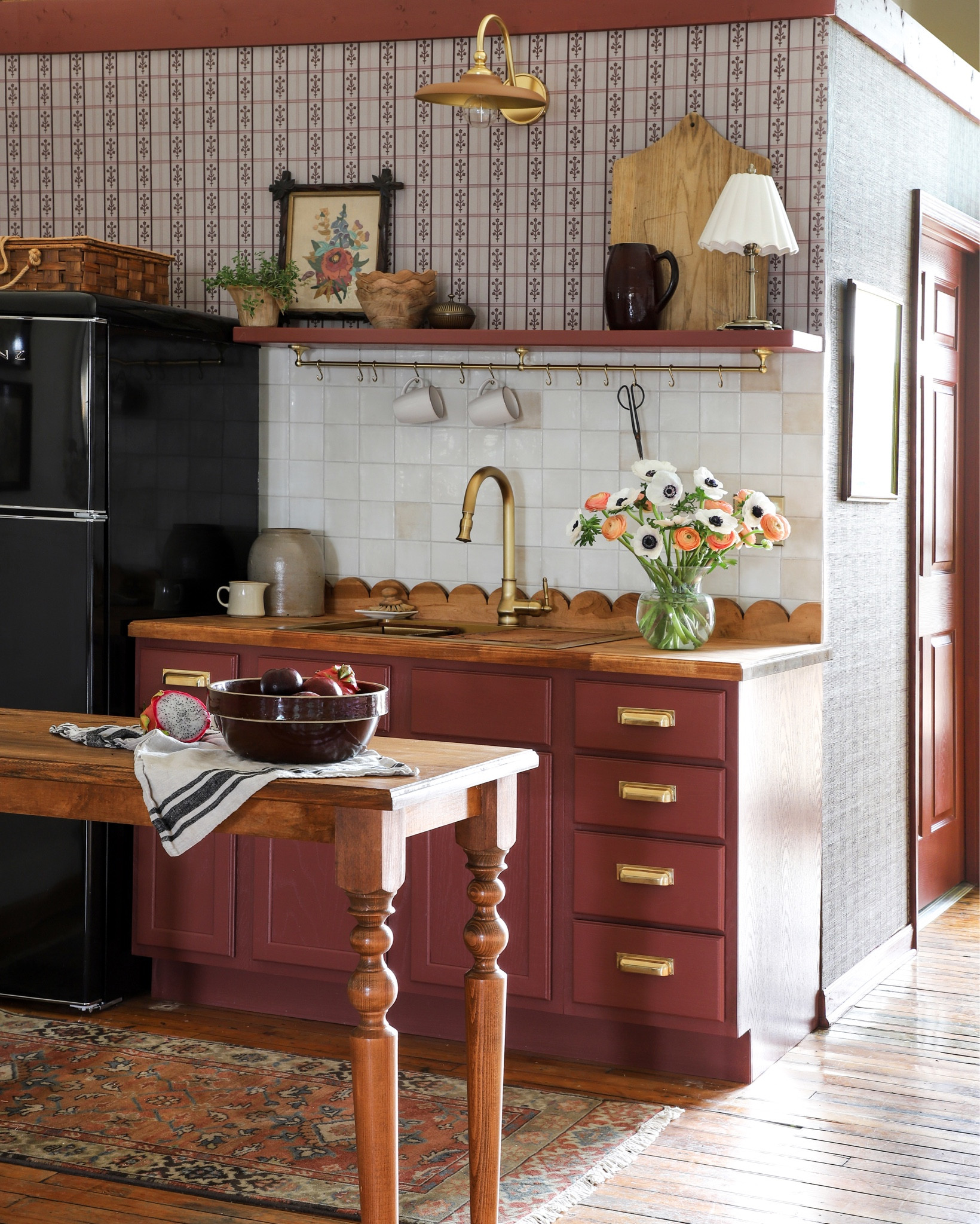 The kitchenette behind the shop is DONE—and I’m completely in love.  So many fun little details in this space that make my heart happy! I went for a plum-raspberry-all-the-fruity-vibes cabinet color and I think it’s officially one of my new faves. The hardware and lighting? All from the ever-amazing Rejuvenation—painted sconce, solid-brass pulls, the most charming lamp, and that rug… the perfect cherries on top of this sweet little kitchenette. Their lighting is always so stunning and easy to customize, and this sconce pulled out the pink details in the wallpaper from my newest collection—bringing the whole space together. Everything Rejuvenation makes just elevates a room!


#LTKHome