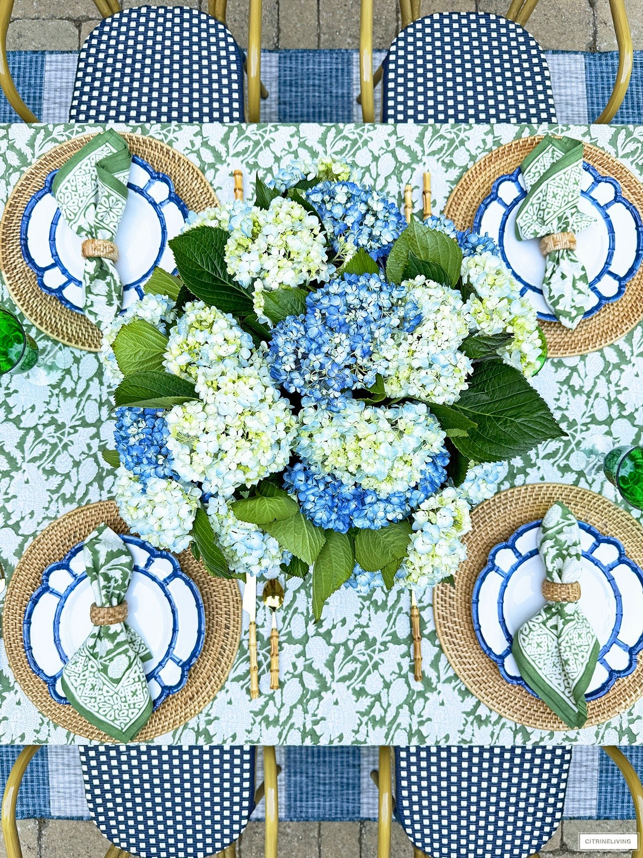 Create a simple outdoor tablescape with just a few key pieces! It takes only minutes to pull this look together! 💙💚

#LTKHome #LTKSeasonal