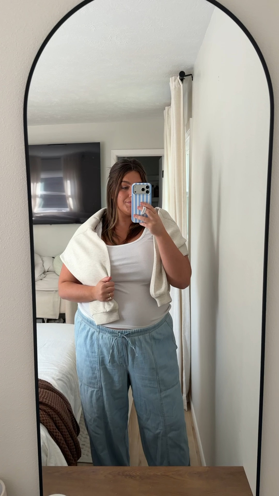 The cutest drawstring stretchy denim that I can wear during pregnancy and after. Wearing a size 2X in everything.

#LTKootd #LTKTall #LTKBump