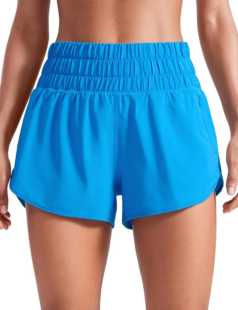 CRZ YOGA High Waisted Dolphin Running Shorts for Womens Mesh Liner Gym Workout Athletic Shorts wi... | Amazon (US)