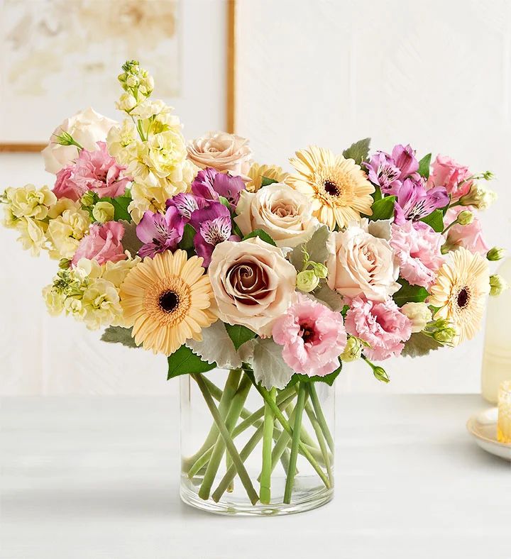 Spring’s natural beauty, captured in flowers. Our charming bouquet features a loose, stylized d... | 1800flowers.com