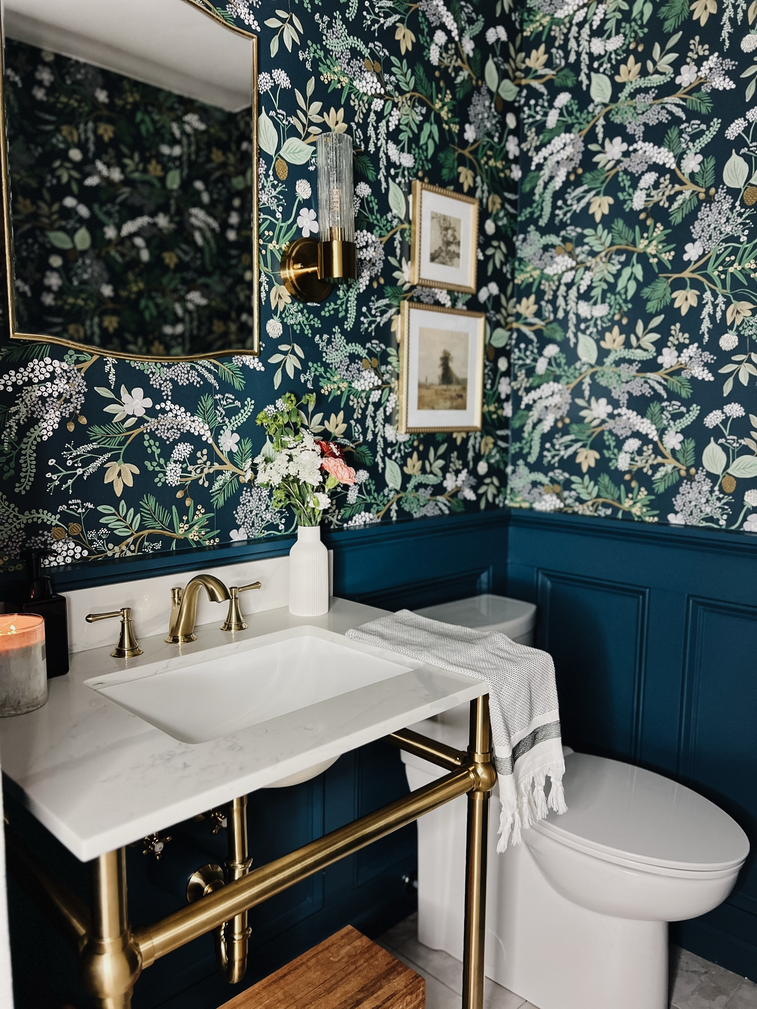 This vintage modern powder bath remodel is probably my favorite project this year! I love the brass console sink with white quartz top, the gorgeous floral wallpaper and stone look peel and stick floors for that classic and elegant look! Everything is from Lowe’s and the wallpaper is currently on sale! 

#LTKHome