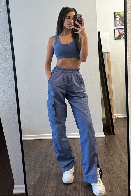 I’m obsessed with Alo and this set is one of my favorites. So comfy. The pants are my favorite and you can unzip the bottom of them. Also these sneakers I wear with everything. Size XS pants and small top for reference 

#LTKunder100 #LTKFind #LTKfit
