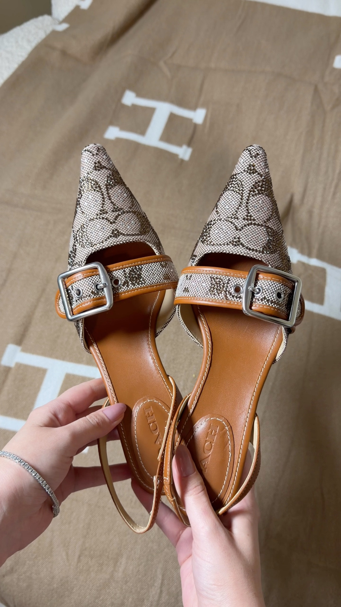 Loving the Coach signature jacquard collection and the Margot slingback kitten heel had to come home with me 😍 they’re so beautiful with a pair of flared denim and make the most beautiful gift just in time to wear to holiday parties especially New Year’s Eve 
#LTKShoeCrush

#LTKGiftGuide #LTKHoliday