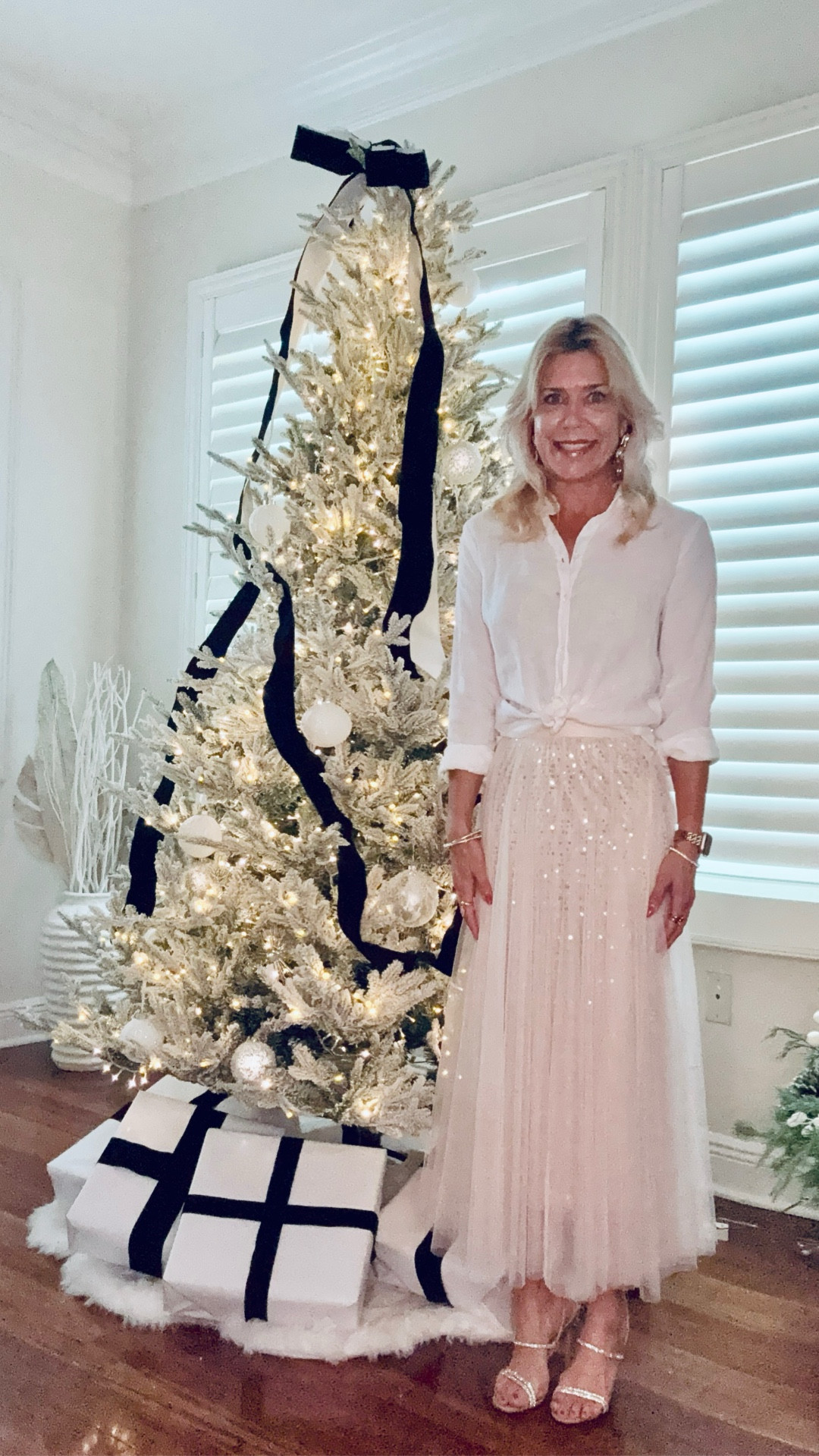 This sequin tulle overlay skirt makes a statement posed with a white button down shirt or wear with an ivory sweater. Easy and elegant. I’m wearing a size small but had skirt tailored smaller. Blouse fits true to size. Skirt is from ZAA Studio boutique (St. Petersburg, FL).

#LTKOver40 #LTKootd #LTKPetite
