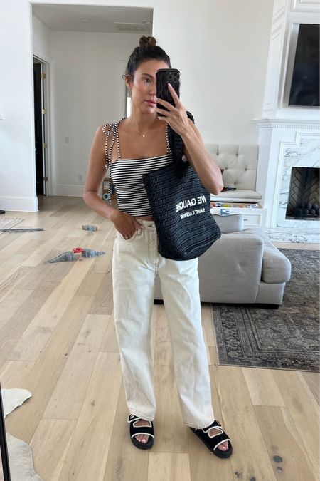 Casual summer outfit 🤍

Weekend outfit, mom outfit, casual outfit, white denim, white pants, ysl beach bag, black tote, striped tank, amazon find, amazon fashion, Christine Andrew 

#LTKStyleTip #LTKFindsUnder50 #LTKSeasonal