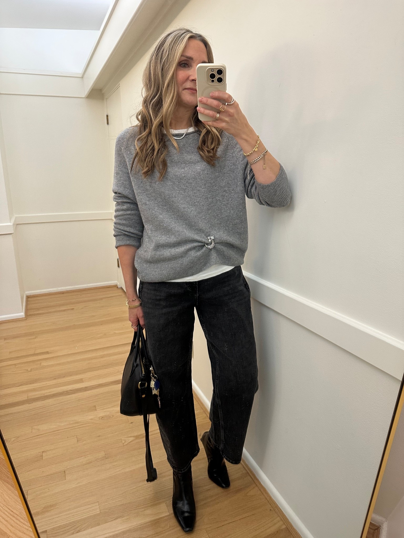 Today’s outfit! Love vintage brooches and wanted to try out this new trend! Linked some I thought were cute. Quince cashmere sweater with Spanx barrel jeans and black boots 



#LTKFindsUnder100 #LTKootd #LTKOver40