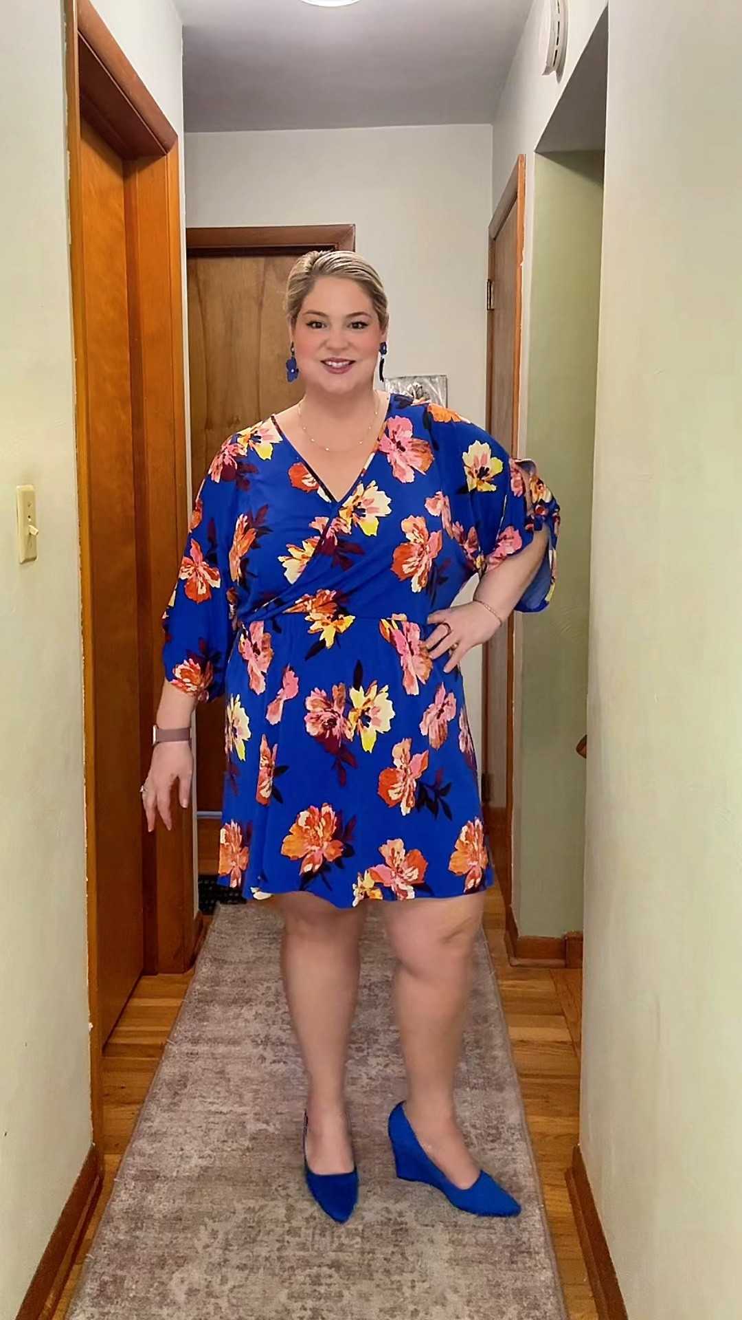 Blue floral wrap dress that actually fits a curvy body right.

True wrap shape for waist definition, no pulling at the bust, and a length that works for both work and everyday. The cobalt + bold floral makes it a full outfit without needing much else.

Styled with tonal statement earrings and a classic pointed heel to keep it polished but easy.

This is one of those pieces that takes the guesswork out of getting dressed.

#LTKWorkwear #LTKootd #LTKSeasonal