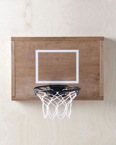 This wall mounted basketball hoop is a fun wall decor addition to a room. Would look great in a kids room, playroom, office or mancave that has modern farmhouse, minimalist or contemporary decor.

#LTKhome #LTKfamily #LTKkids
