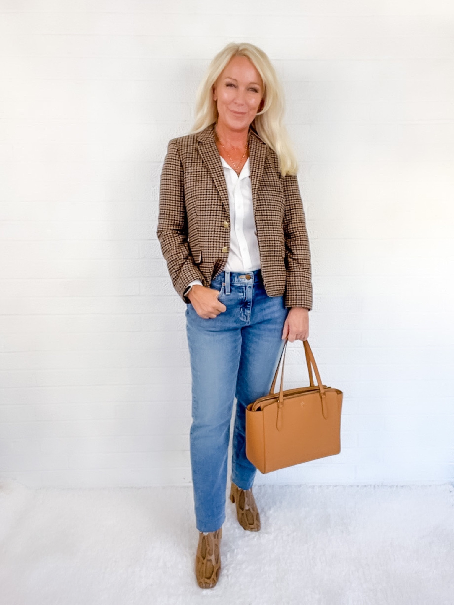 Houndstooth blazer paired with a white button down and straight leg jeans…classic timeless style!

#LTKworkwear #LTKSeasonal #LTKstyletip