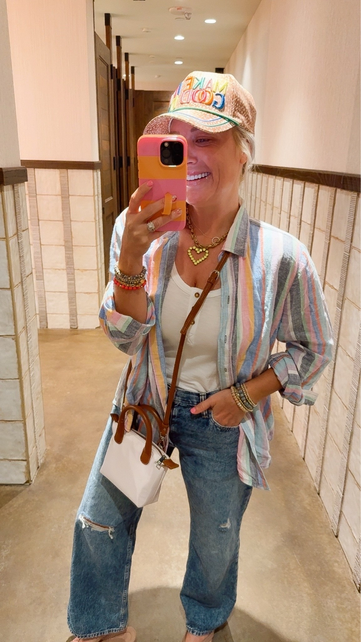 Today’s causal summer mom outfit for a day of shopping and doing summer errands 
Shirt size small 
Jeans size 28