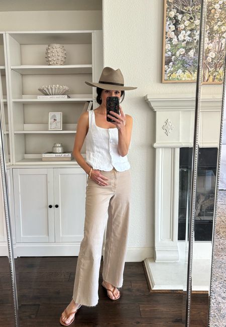 - Linen vest. Wearing a size 2. On sale. SO comfortable.
- Wide leg, cropped culottes. LOVE this “sand” color. I’m wearing my regular size 2. The reviews are mixed, but I absolutely love them and they fit so well. 
- Janessa Leone packable hat. I’m wearing a medium.
- Skims t-shirt bra  
- leather flip flops. They run true to size. 

Neutral summer outfit 
Beige jeans
White linen vest

#LTKOver40 #LTKSaleAlert #LTKTravel