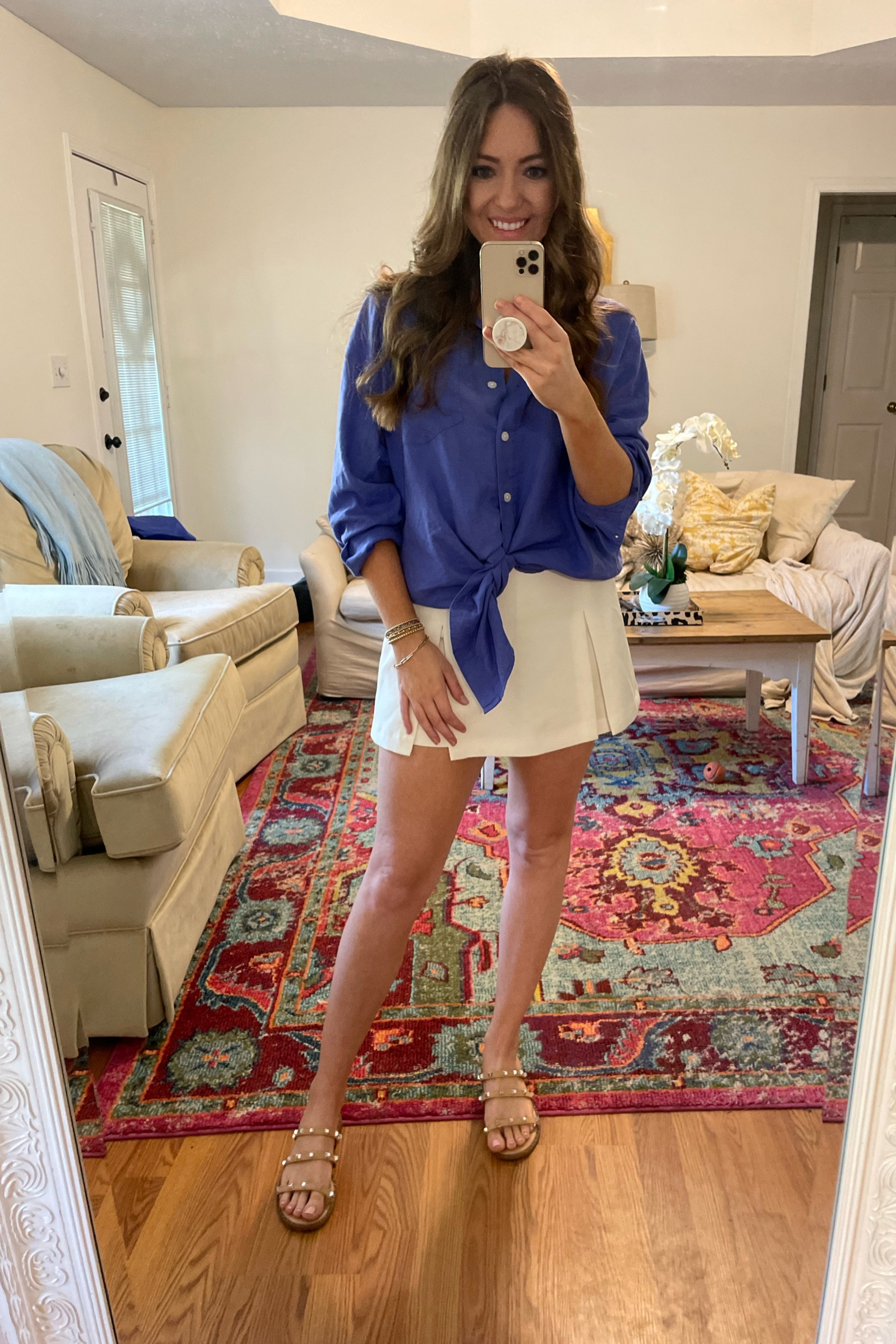 Oversized “linen” style shirt from Target. I’m wearing a small and when it’s untied it covers the butt so could be used as a swimsuit coverup too. White skort was from a local boutique. Sandals are from Target last year. 