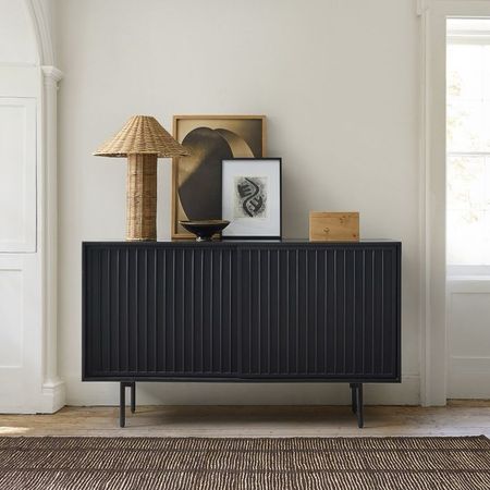 This BLACK modern slatted buffet is on my ‘want list’ for West Elm’s next sale! A stunner! ✨ I saw it on display in store in the walnut color. Attaching that photo & video. 

Very well made, nice height, great storage. Would be great in an entry way, bonus room, bedroom, dining room or office! 

🏷️ studio mcgee x target new arrivals, coming soon, new collection, fall collection, spring decor, console table, bedroom furniture, dining chair, counter stools, end table, side table, nightstands, bedside table, black nightstand, framed art, art, wall decor, rugs, area rugs, target finds, target deal days, outdoor decor, patio, porch decor, sale alert, tj maxx, loloi, cane furniture, cane chair, pillows, throw pillow, arch mirror, gold mirror, brass mirror, vanity, lamps, world market, wayfair, wayfair sale, weekend sales, opalhouse, target, jungalow, boho, wayfair finds, sofa, couch, dining room, high end look for less, kirkland's, cane, wicker, rattan, coastal, lamp, high end look for less, studio mcgee, mcgee and co, target, world market, sofas, couch, living room, bedroom, bedroom styling, loveseat, bench, magnolia, joanna gaines, pillows, pb, pottery barn, nightstand, cane furniture, throw blanket, console table, target, joanna gaines, hearth & hand, arch, cabinet, lamp, it look cane cabinet, amazon home, world market, arch cabinet, black cabinet, crate & barrel
#LTKSpringSale #LTKxWayDay #LTKSeasonal #LTKhome #LTKfamily

#LTKVideo #LTKhome #LTKfamily