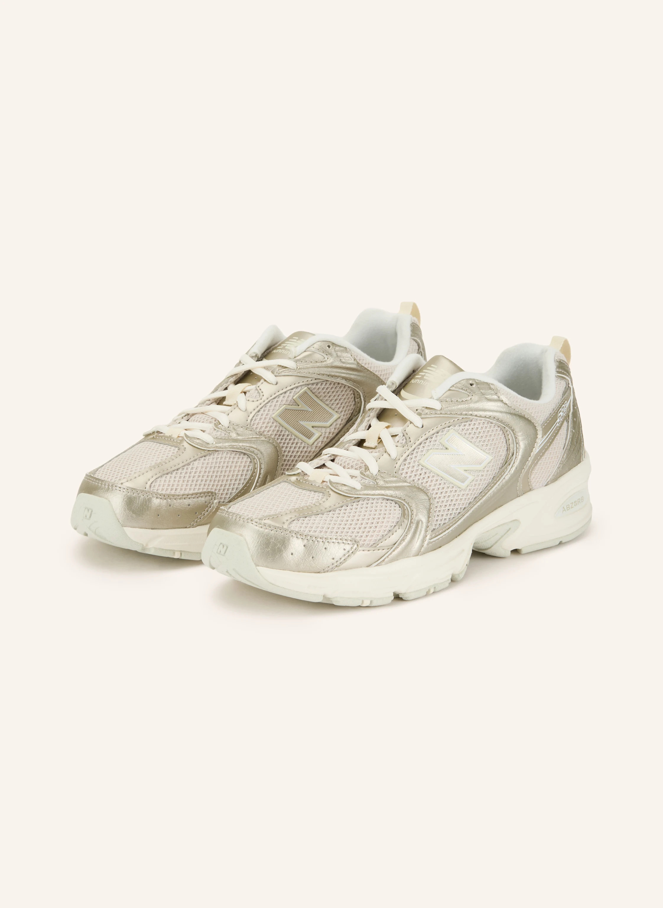 new balance Sneaker 530 in beige / gold | Breuninger (DACH)