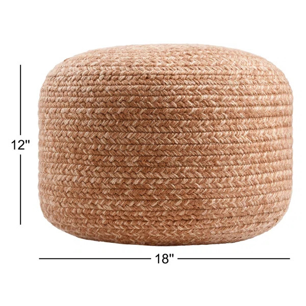 This round upholstered pouf brings a touch of Southwestern flair to your home. Handwoven from rec... | Wayfair North America