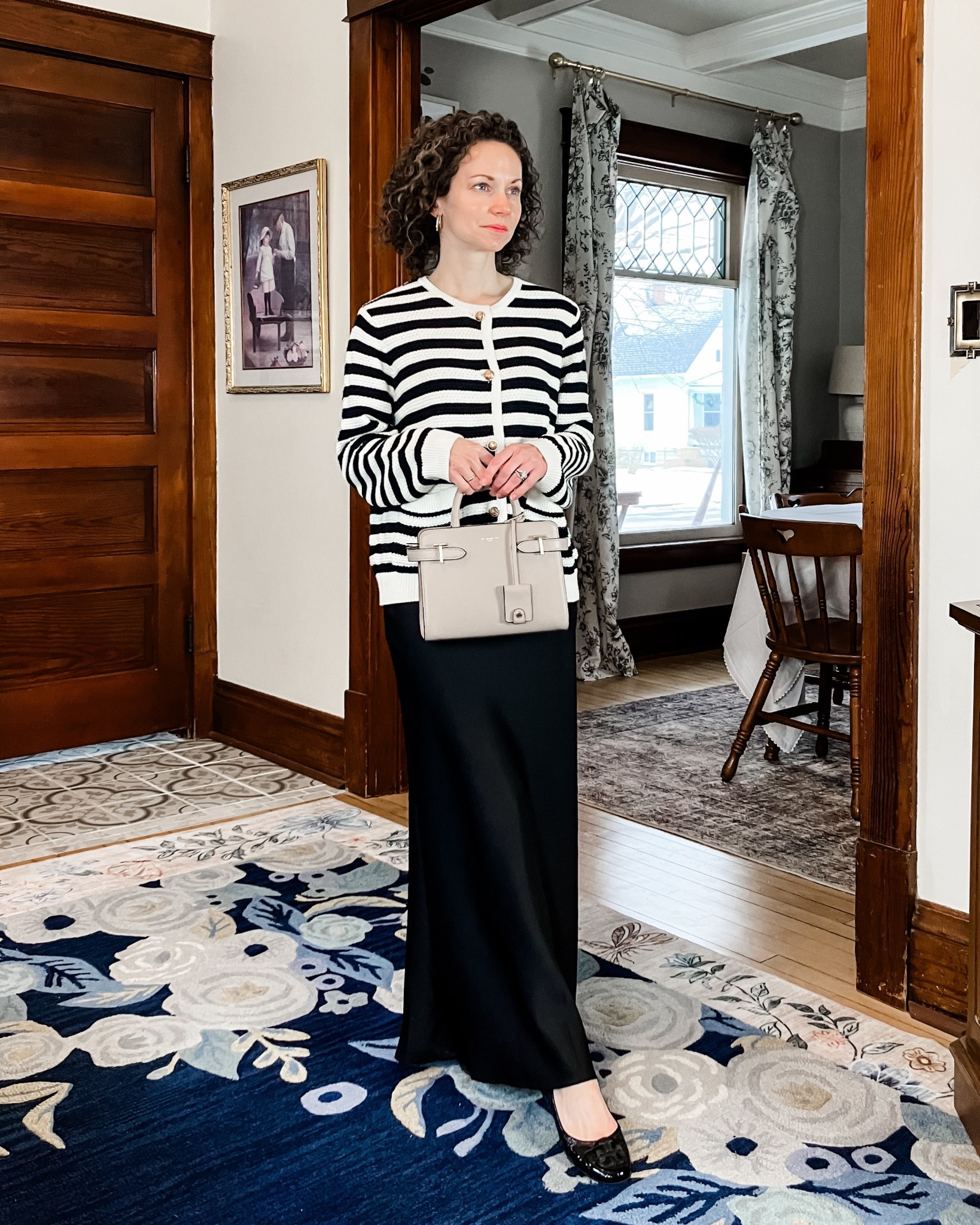 Sharing a recent skirt I got from Amazon!
Black and white stripe cardigan from Amazon. 
Black satin skirt from Amazon. 
Gold braided hoop earring are old, linking similar. 
Neutral leather handbag from Le Tanneur. 
Black leather ballet flats from Tori Burch, linkimg similar, mine are old. 
Petite outfit. Classic outfit. Modest outfit  


#LTKgrwm #LTKootd #LTKOver40